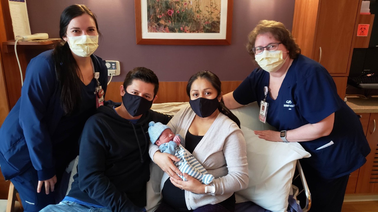 Baby Lucas Orellana Carcaño with his parents and medical team; photo courtesy of SSM Health St. Mary's Hospital