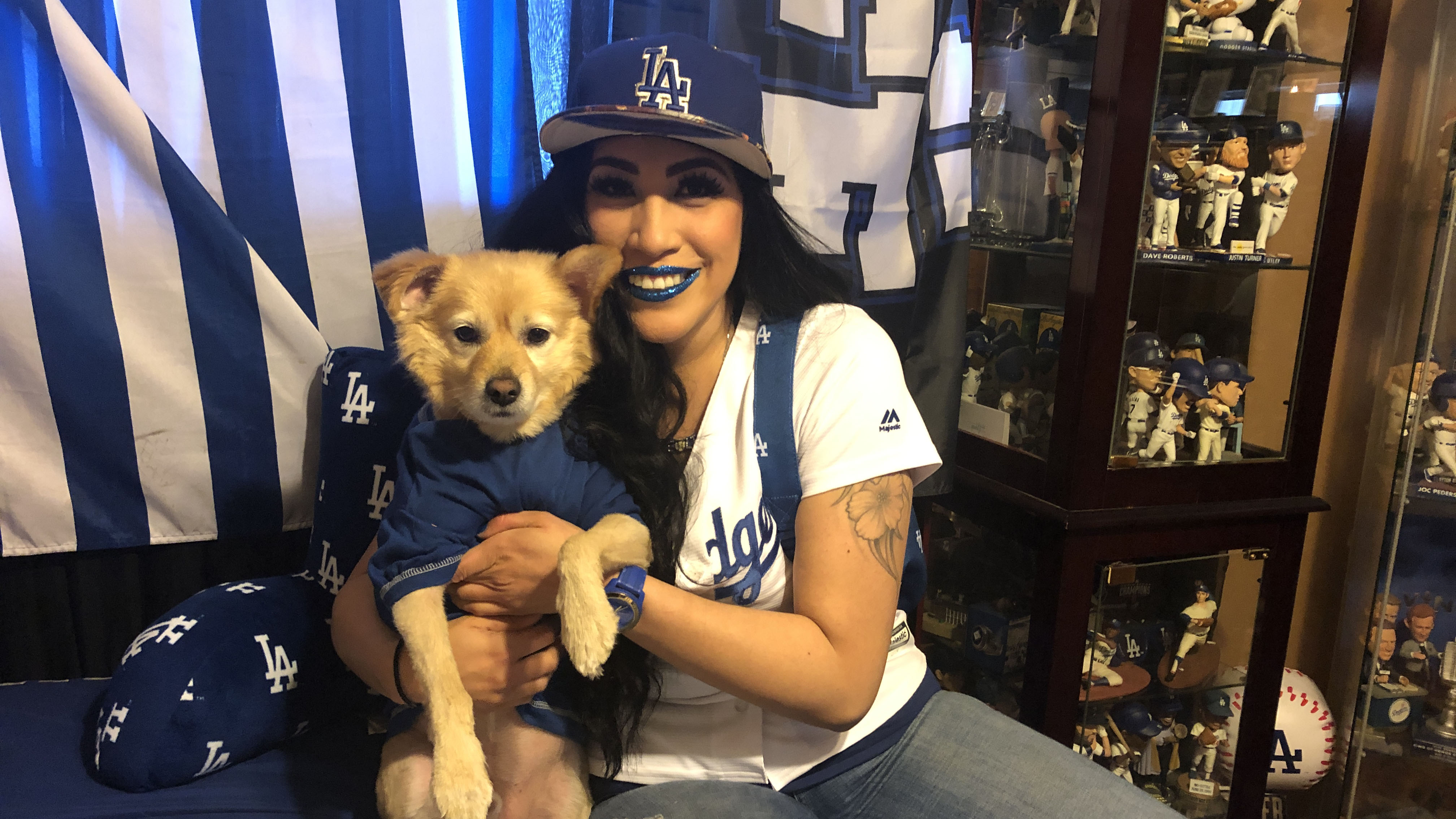 Dodgers fans are seen dressed up in costumes for halloween prior