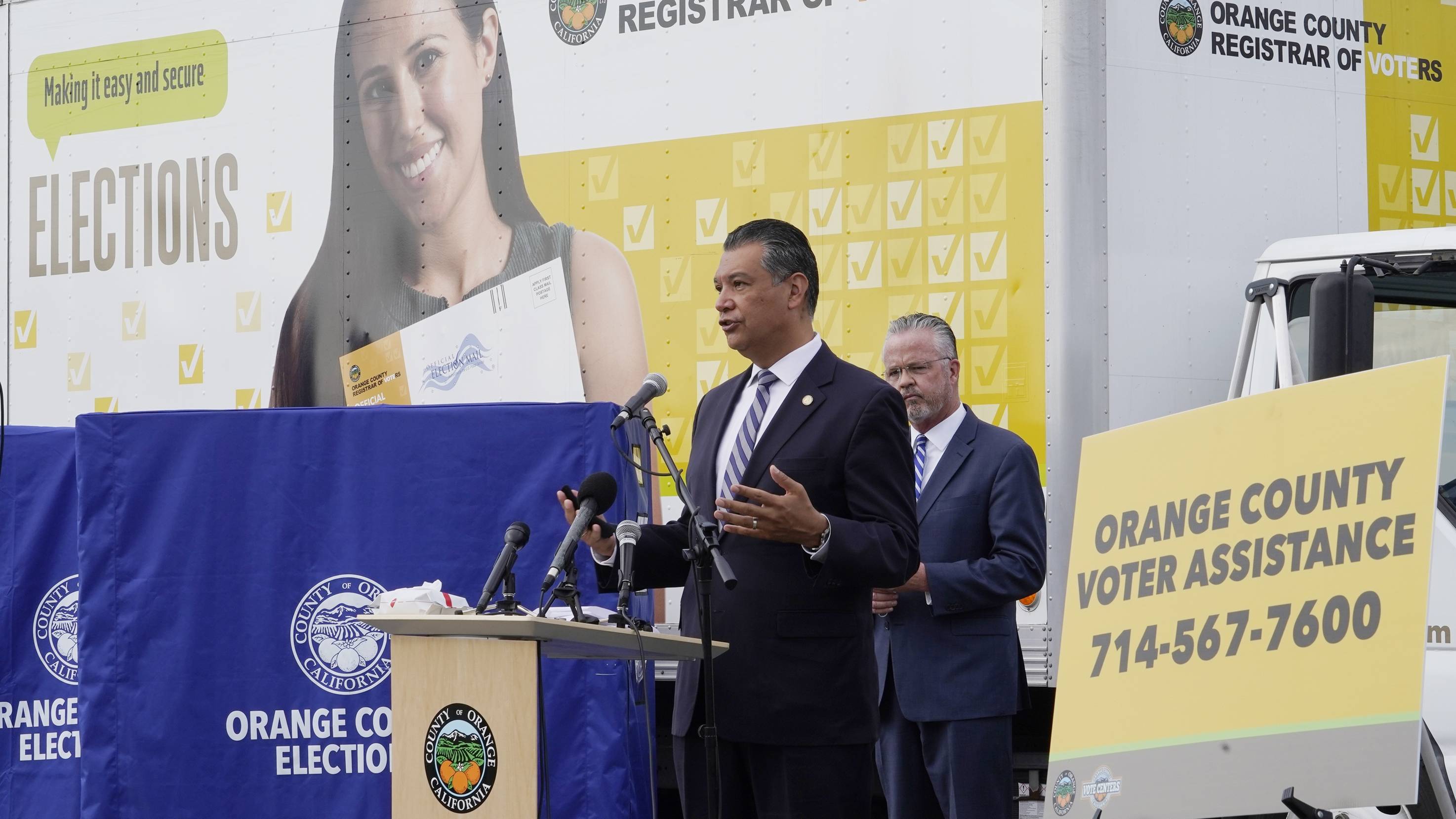 In this Oct. 5, 2020, file photo, California Secretary of State Alex Padilla, left, and Orange County Registrar of Voters Neal Kelley hold a news conference on Orange County's comprehensive plans to safeguard the election and provide transparency in Santa Ana, Calif. (AP Photo/Damian Dovarganes, File)