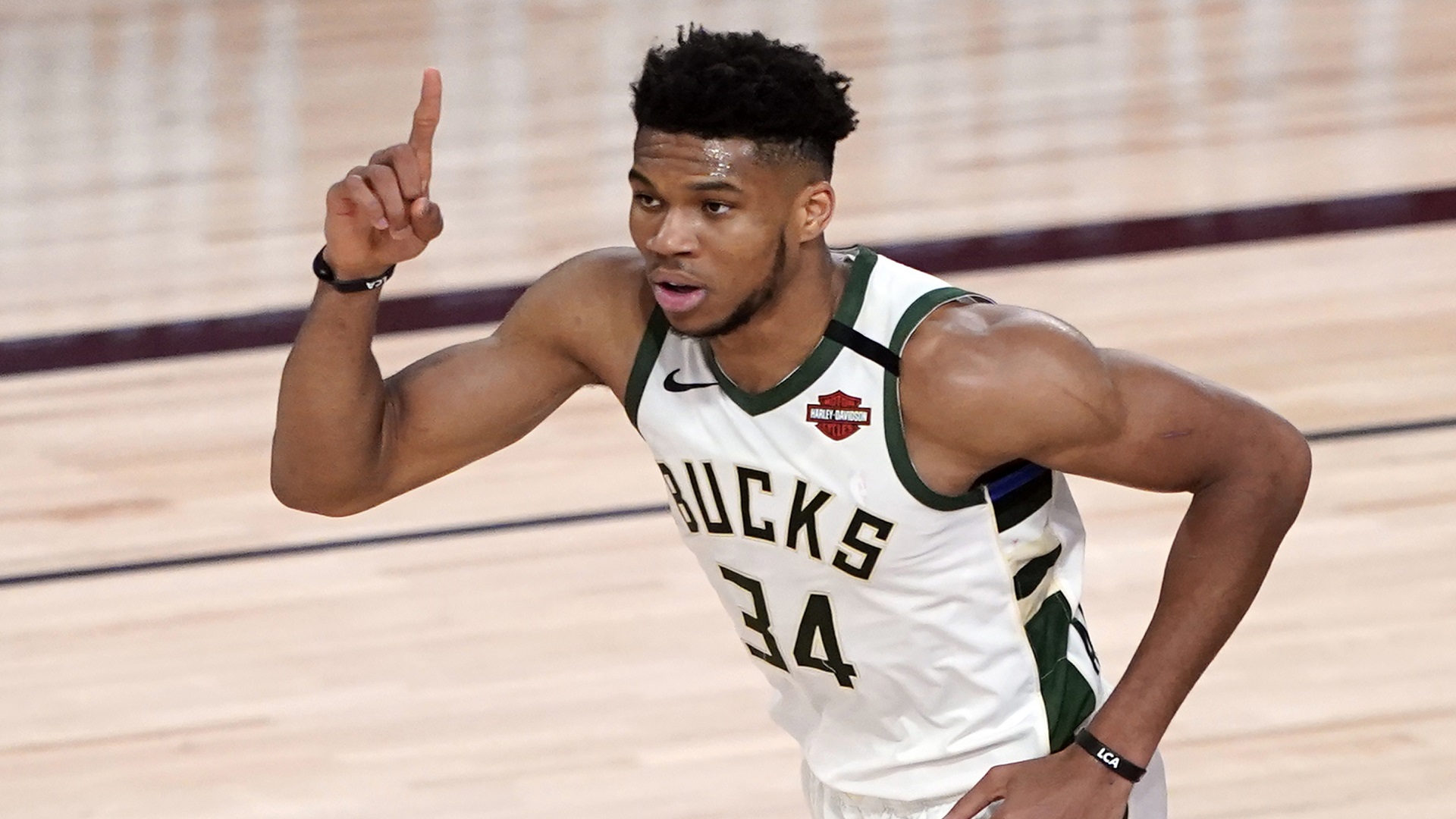 Giannis Antetokounmpo praised the “amazing” moves the Bucks have made to improve their team, but the two-time reigning MVP didn’t indicate whether he would sign their supermax contract extension offer. Right now I’m not focusing on that,” Antetokounmpo said Wednesday, Dec. 9, 2020. (AP Photo/Ashley Landis, File)