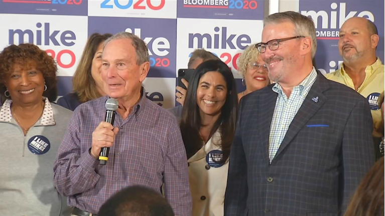 Michael Bloomberg has dropped out of the race. He was in Orlando on Super Tuesday, one of many stops for him. Orlando Mayor Buddy Dyer looks on. (Spectrum News 13)